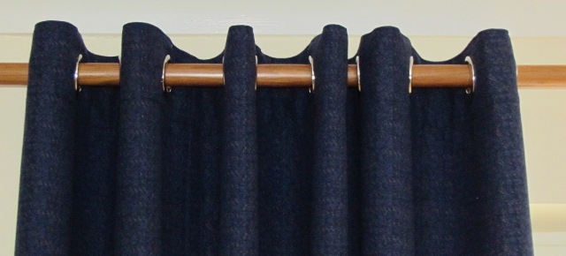 How to Hang a Curtain Rod Without Drilling into the Wall