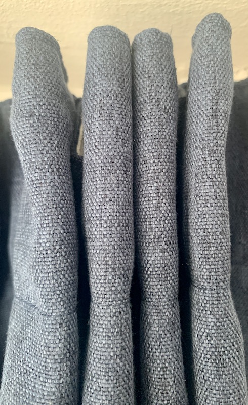 Small section of pencil pleat curtain top